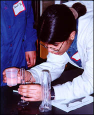 Middle-school girl working on a science activity
